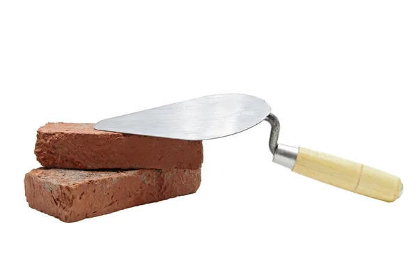 Construction lute trowel with red brick — Stock Photo, Image