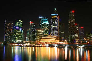 Singapore skyscraper at night clipart