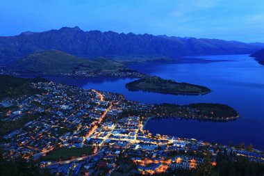 Aerial view of Queenstown at dusk clipart