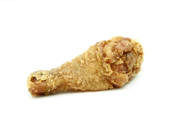 Elszigetelt arany barna ropogós sült csirke alsócomb — Stock Fotó