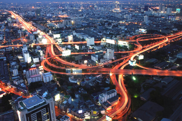 The highest Aerial view of Bangkok Highway at Dusk in Thailand