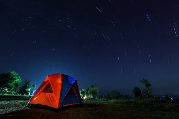 Spiral star trail with campsite at night — Stock Photo, Image
