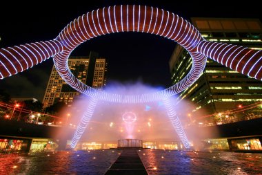 Fountain show at Fountain of Wealth Suntec Tower Singapore clipart