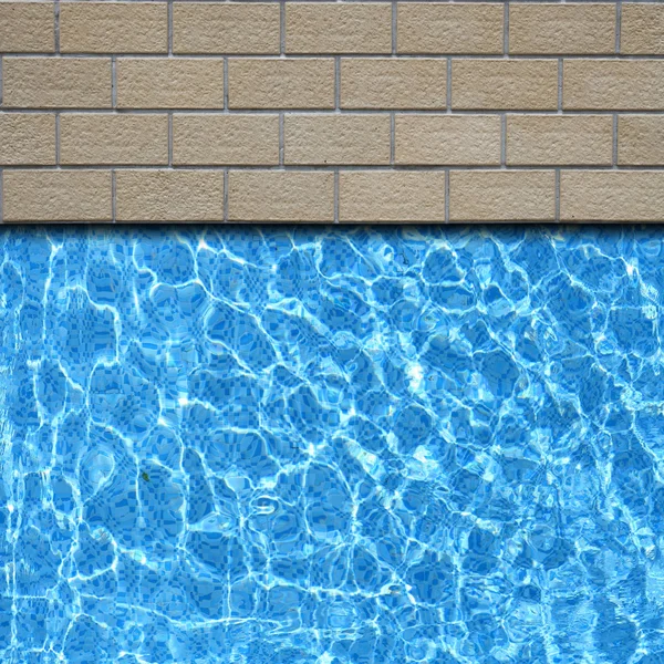 Traditional stone pavement with pool edge background — Stockfoto
