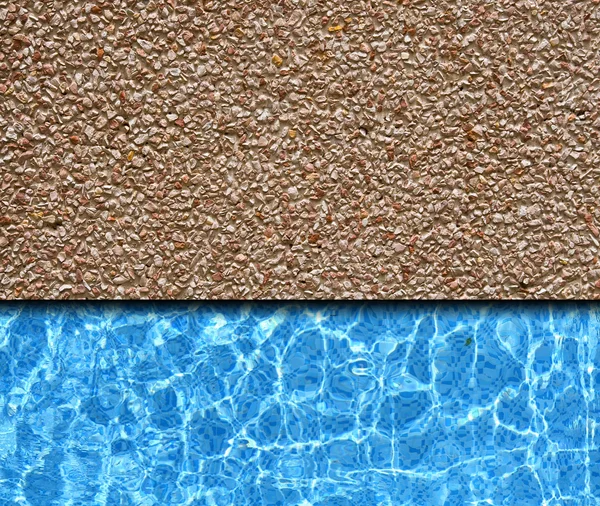 Rode zand stenen bestrating met zwembad achtergrond — Stockfoto