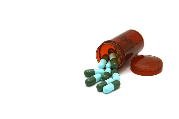 Léky - Lahvička s kapslemi na léky — Stock fotografie