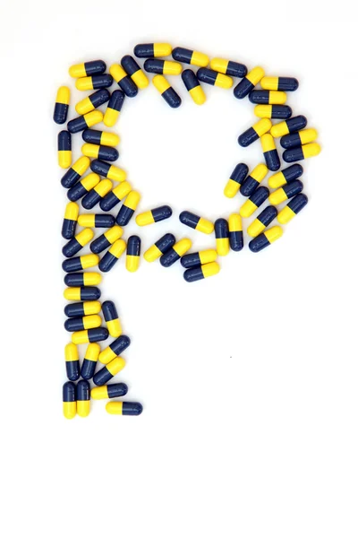 Tıbbi kapsül yapılan harf p alfabesi — Stok fotoğraf