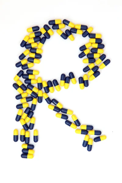 De brief r alfabet gemaakt van medische capsules — Stockfoto