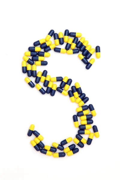 The letter S alphabet made of medical capsules — Stock Photo, Image