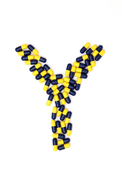 The letter Y alphabet made of medical capsules — Stock Photo, Image