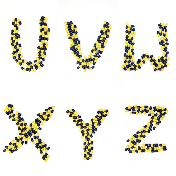 Cápsula del alfabeto UVWXYZ —  Fotos de Stock