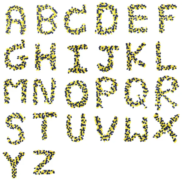 Alfabeto de cápsulas — Fotografia de Stock
