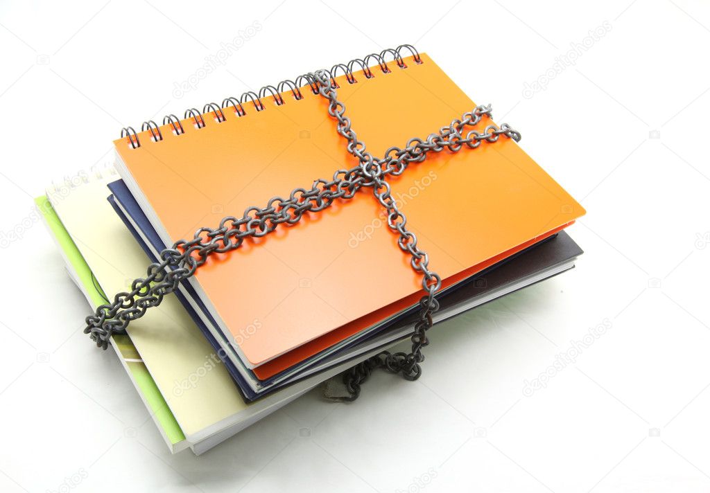 Stack of books with chain