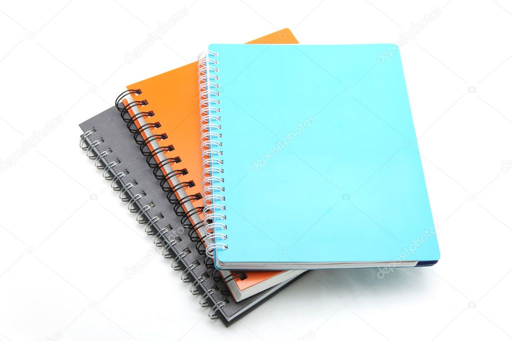 Stack of ring binder book isolated on white
