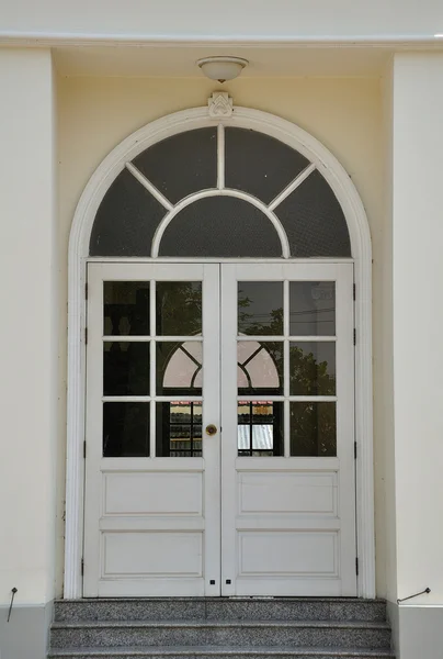 stock image White window on cream wall