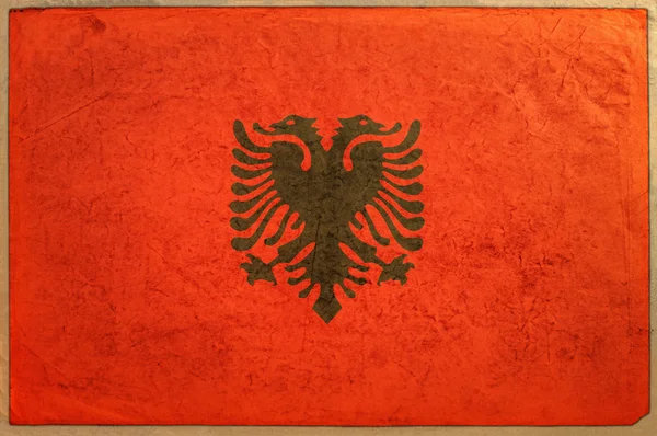 Albania Bandera sobre papel envejecido textura —  Fotos de Stock
