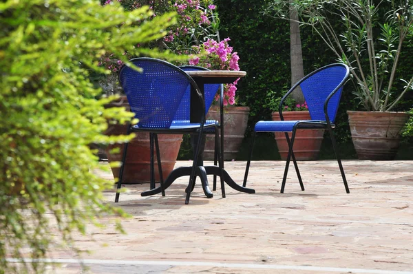 stock image Blue chair in the park