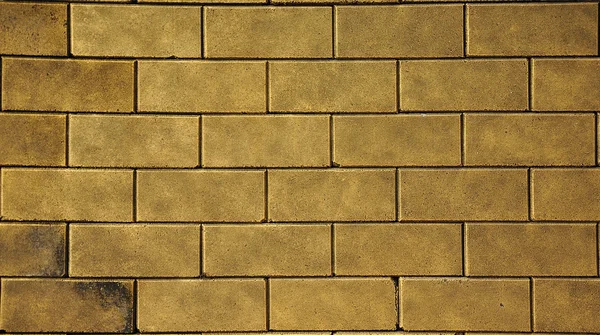 stock image Gold brick wall