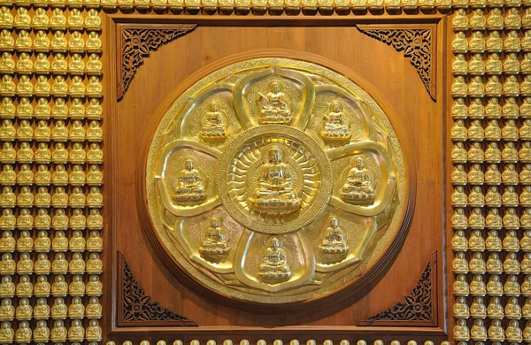 Row and circle of golden buddha statue — Stock Photo, Image