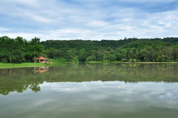 stock image Red pavilion & Refrected in swamp