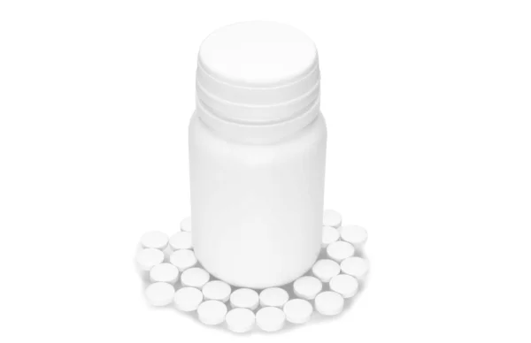 Garrafa branca com comprimidos — Fotografia de Stock