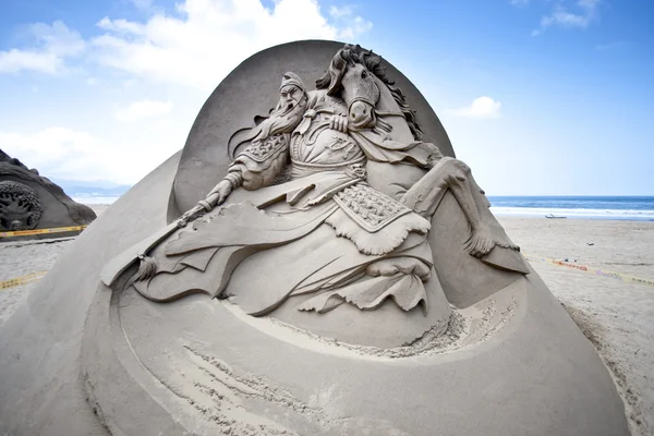 Dio cinese guan scultura di sabbia — Foto Stock