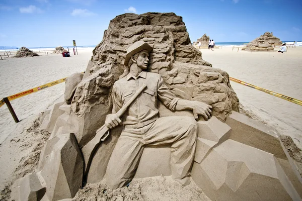 Myśliwy piasku rzeźby — Zdjęcie stockowe