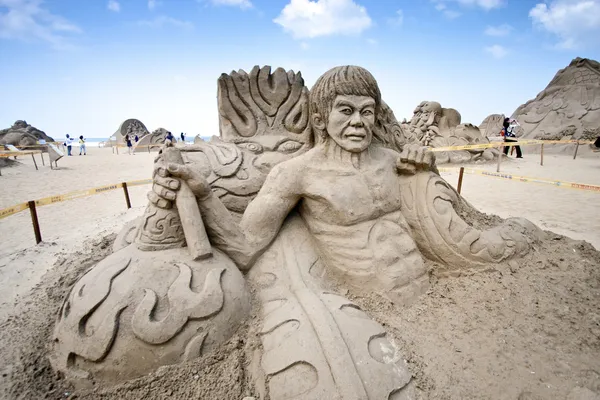 Bruce lee sand sculpture — Stock Photo, Image