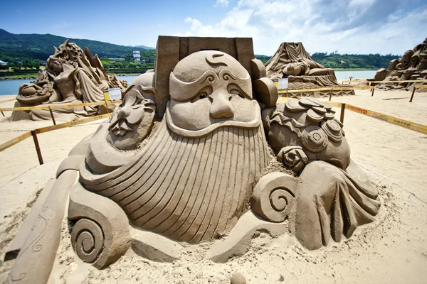 Chinesischer Geldgott Sandskulptur — Stockfoto