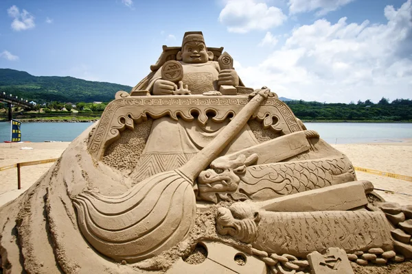 Chinese money god sand sculpture — Stock Photo, Image