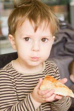 Boy eating cake clipart