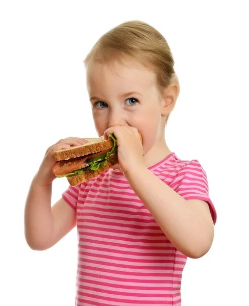 Jovem menina comendo sanduíche isolado no branco — Fotografia de Stock