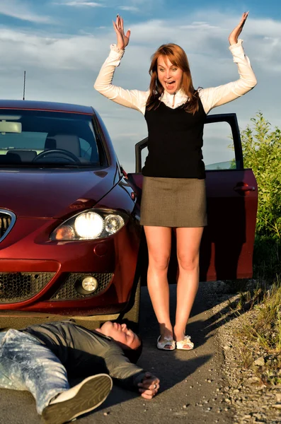 Young girl knocked down a man on a road — Stock Photo, Image