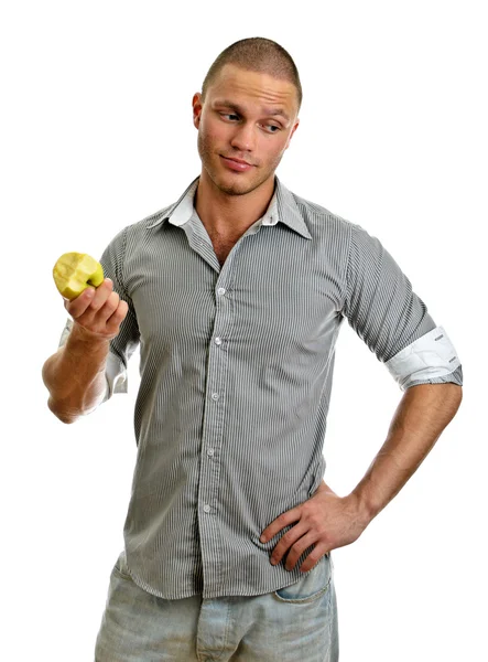 Чоловік їсть яблуко. Ізольовані на білому . — стокове фото