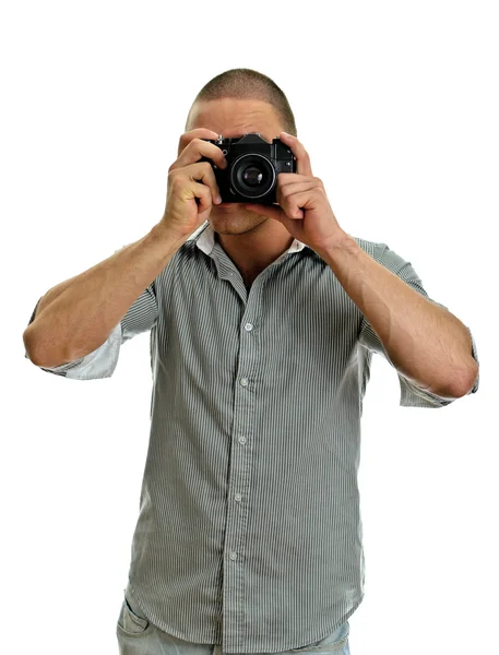 Férfi retro fényképezőgéppel fotózni. elszigetelt fehér. — Stock Fotó
