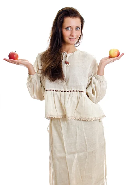 Female in national traditional costume with two apples. Isolated on white. — Stock Photo, Image