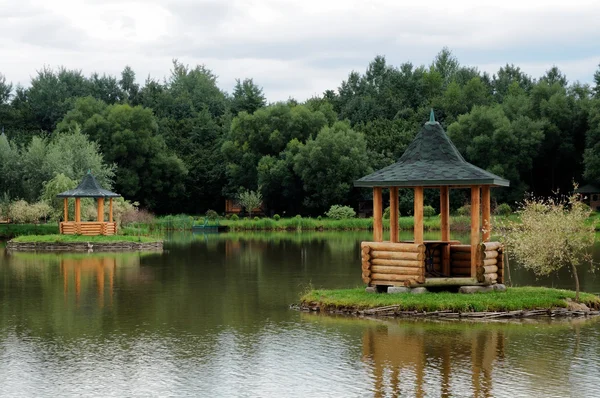 stock image Pergola in middle of a lake