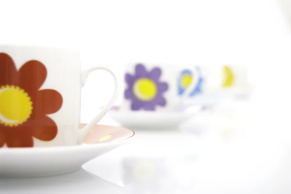 Tea cups in a row — Stock Photo, Image