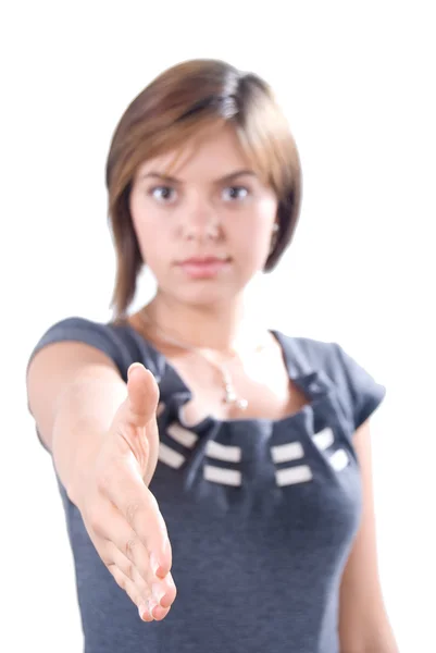Ung kvinna skakar hand Stockbild