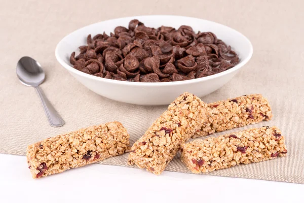 stock image Chocolate cereals and bars with fruits.