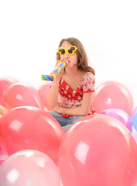 Liten flicka med ballonger — Stockfoto