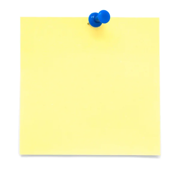 Poznámka: žlutý papír s modrým připínáček — Stock fotografie