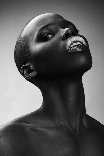 Black African American British fashion model with perfect skin long neck studio portrait — Stock Photo, Image