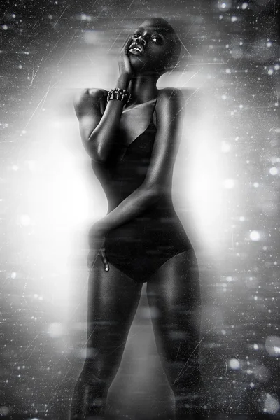 Black African American British fashion model with perfect skin lingerie studio portrait — стокове фото
