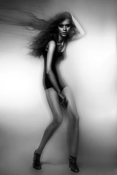 Young beautiful Russian model slim studio test posing dancing portrait long hair — Stock Photo, Image