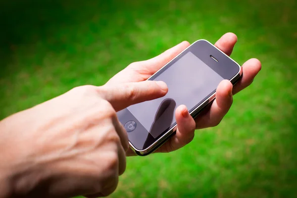 Mobile phone in the hand — Stock Photo, Image