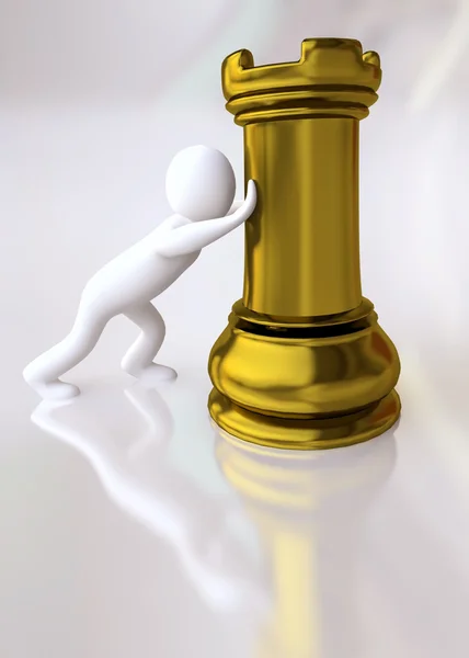 Mężczyzna popychając szachy wieża figura — Zdjęcie stockowe