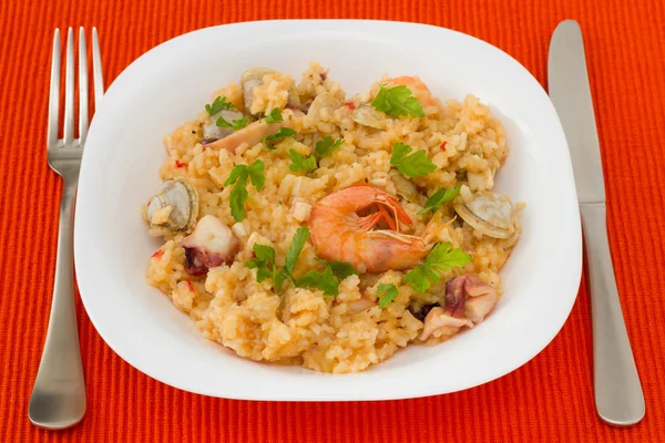 Rice with seafood in the white plate — Stock Photo, Image