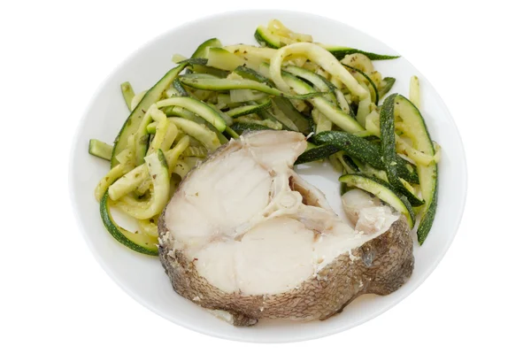 Pescado cocido con verduras en plato blanco — Foto de Stock