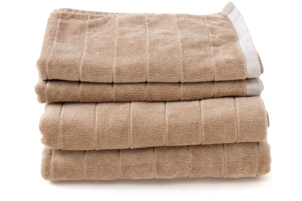 Brown towels on white background — Stock Photo, Image